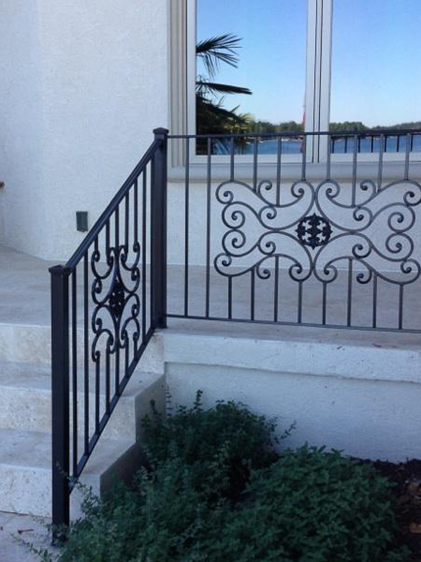 glass accents ironwork wrought iron rails