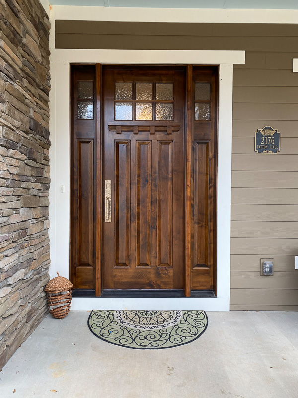 knotty alder wood entry door sidelights hammered glass rocky mountain hardware hammered silicon bronze light