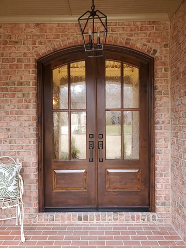 knotty alder wood arched front door seedy baroque glass